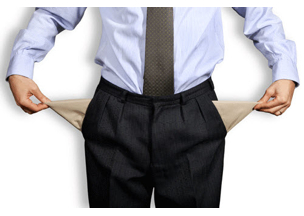 man pulling out empty pockets