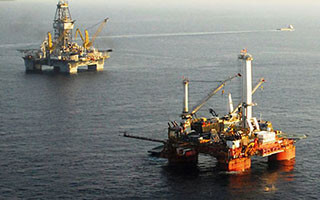 Oil rigs in the Gulf of Mexico. USCG photo.