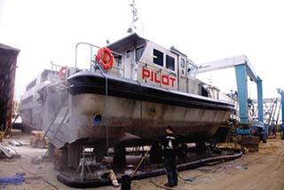 A pilot boat is serviced at Yank Marine&#039;s New Jersey yard. Yank Marine recently received a Marad small shipyard grant. Kathy Bergren Smith photo.