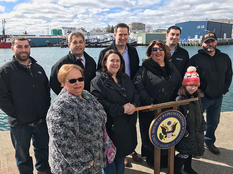Rep. Seth Moulton (center) stands with supporters in Gloucester, Mass., to announce legislation that would establish a national program to support young people looking for careers in the commercial fishing industry. Photo courtesy Office of Congressman S.