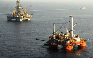 Oil rigs in the Gulf of Mexico. USCG photo.