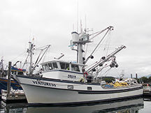 Photo: A salmon seiner docks in Kodiak between sets; Melissa Wood.