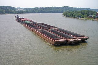 A coal barge on the Ohio River. Creative Commons photo/Tim Kiser.