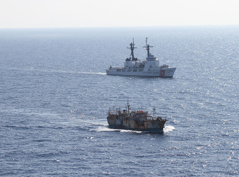 The crew of the Coast Guard Cutter Rush escorts the suspected high seas drift net fishing vessel Da Cheng in the North Pacific Ocean Aug. 14, 2012. USCG photo.