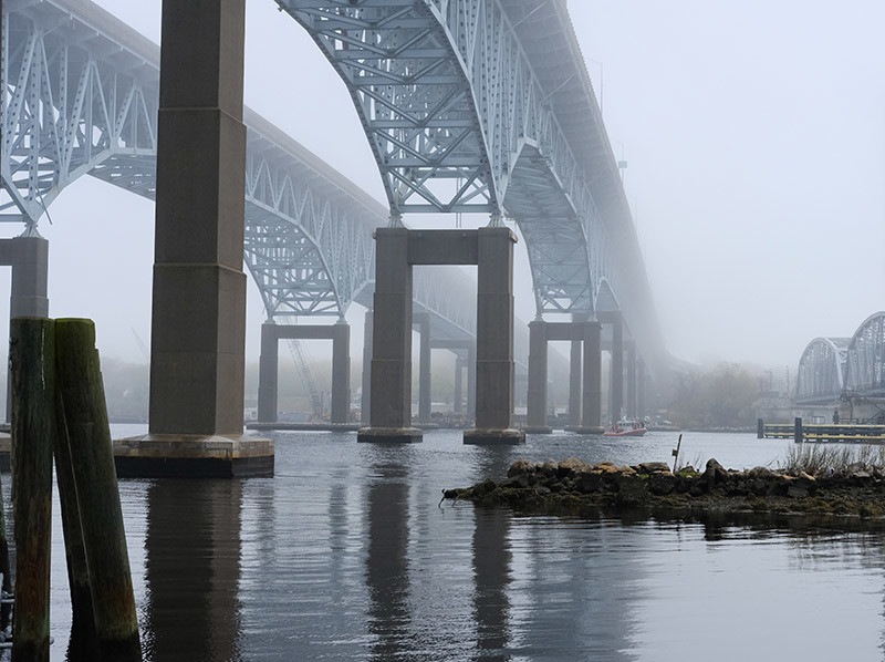 A Coast Guard medium response boat awaits the MOTT drop in the Thames River beneath the Gold Star Memorial Bridge in New London, Ct. Jean Paul Vellotti photo.