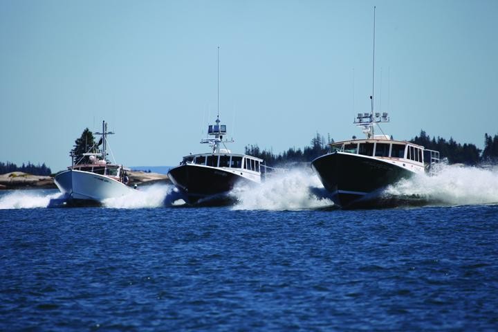 Sailor's Way (right) wins the 2019 John's Bay Boat Co. Race at Stonington, Me. Jon Johansen photo