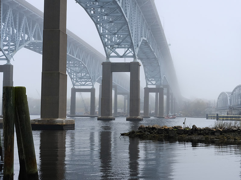 A Coast Guard medium response boat awaits the MOTT drop in the Thames River beneath the Gold Star Memorial Bridge in New London, Ct. Jean Paul Vellotti photo.