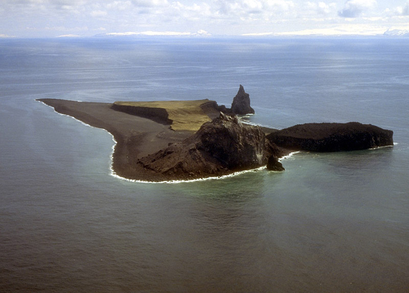 Bogoslof Island, Alaska, is the summit of a largely submarine stratovolcano located in the Bering Sea. U.S. Geological Survey photo by T. Keith.