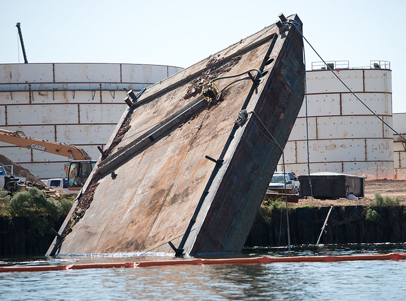 Sunken tugboat, barge submerged in upper Houston Ship Channel