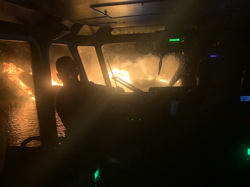 Coast Guard rescues 3 people from burning vessel