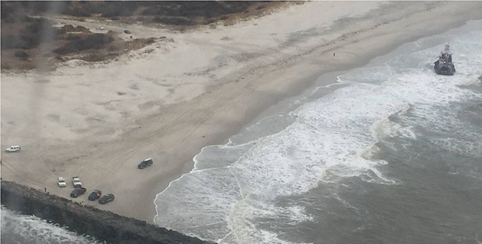 Tug, barge run aground near Absecon Inlet