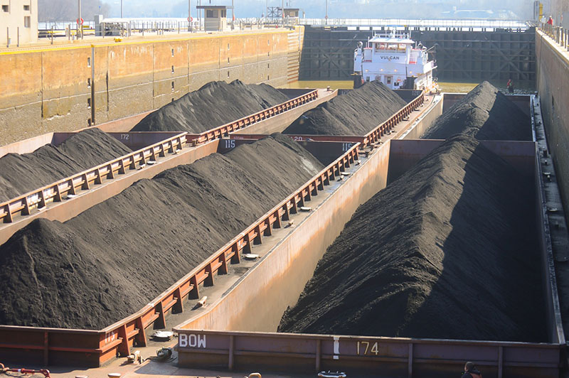 Barge locking through Montgomery Locks and Dam.