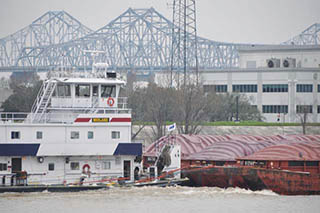 Covered hopper barges under tow. David Krapf photo.